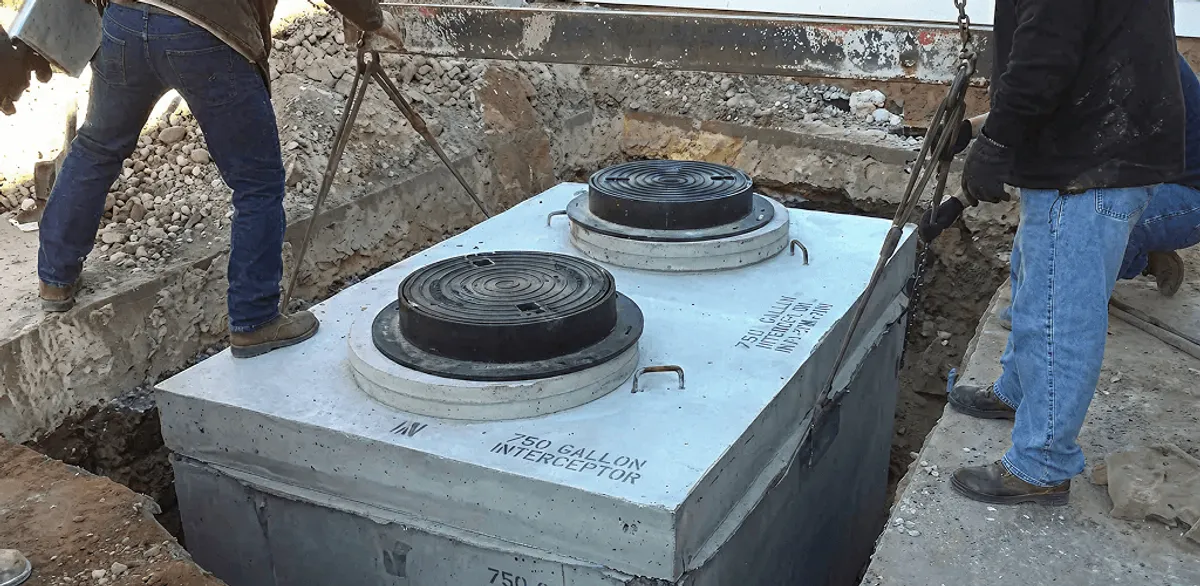 Grease trap installation for a commercial property drainage system in Bellevue, WA